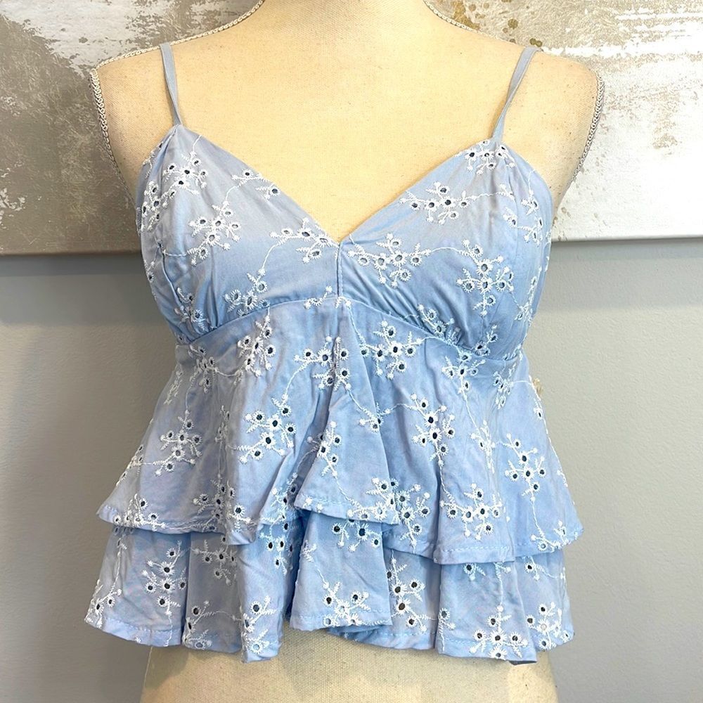 Ruffle Sleeveless Eyelet Tank